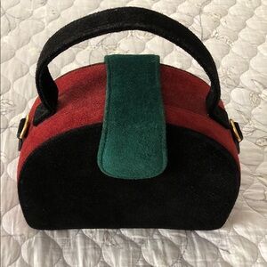 Chic Black and Red Mini Bag with Green Accent